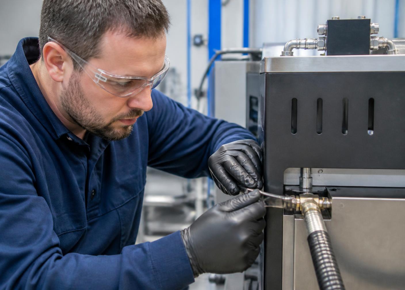 Technical support work on an industrial adhesive application system